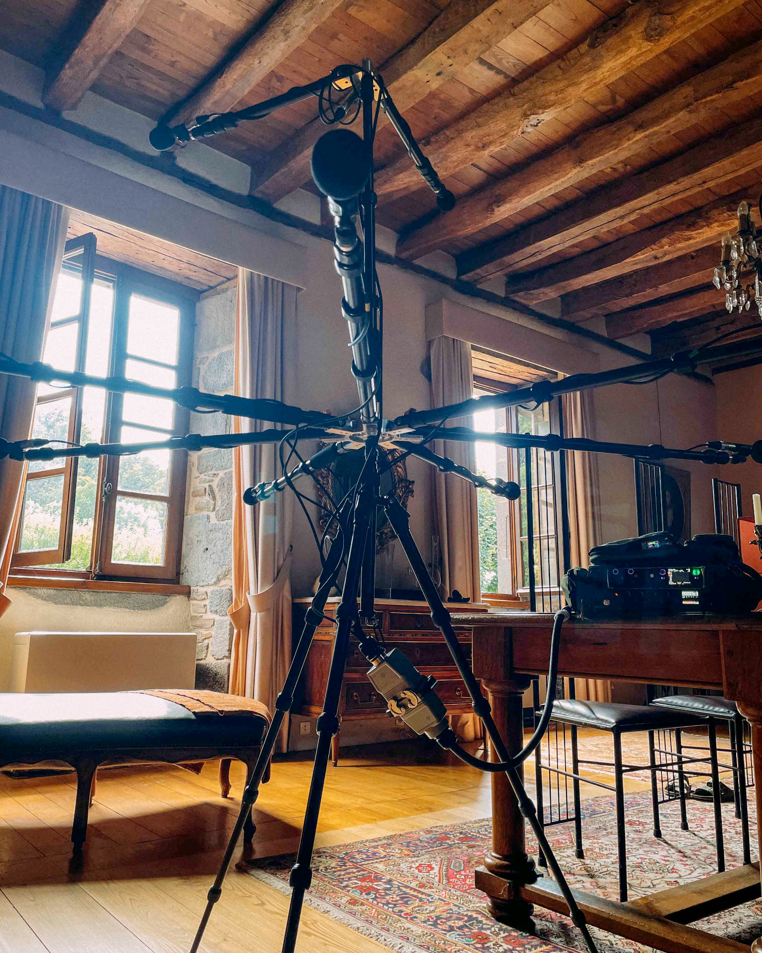 Audio Field ATMOS Tree microphone array set up in a living room with wooden beams